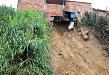 Deslizamento provoca queda de muro em residência no bairro São Benedito em Santo Antônio de Jesus e acende alerta às margens da rodovia BA-046; assista